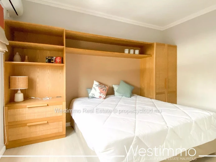 Flic en Flac - Luxurious waterfront appartment with swimming pool and lagoon views.