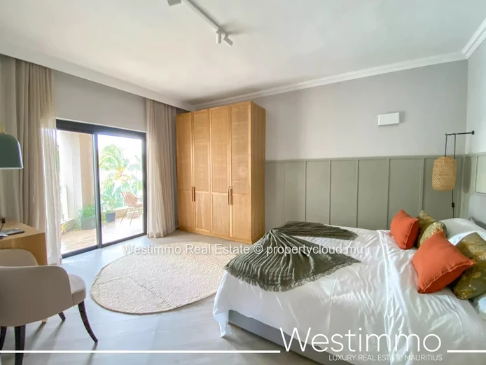 Flic en Flac - Luxurious waterfront appartment with swimming pool and lagoon views.