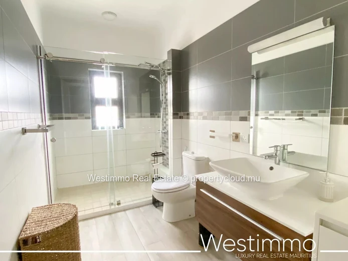 Flic en Flac - Luxurious waterfront appartment with swimming pool and lagoon views.