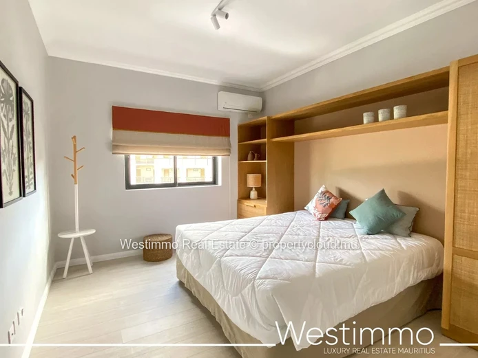 Flic en Flac - Luxurious waterfront appartment with swimming pool and lagoon views.