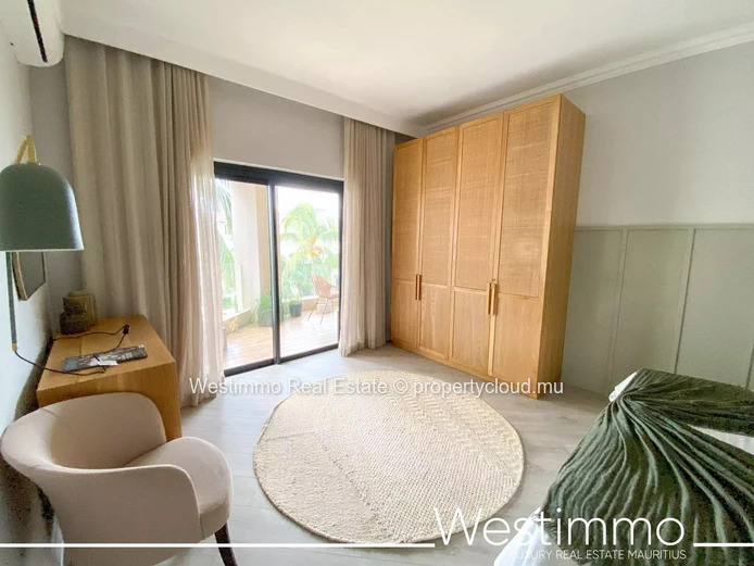 Flic en Flac - Luxurious waterfront appartment with swimming pool and lagoon views.