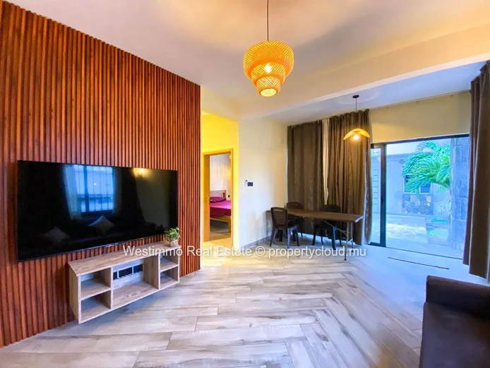 Trou aux Biches - À louer appartement neuf de 2 chambres en rez-de-chaussée avec piscine